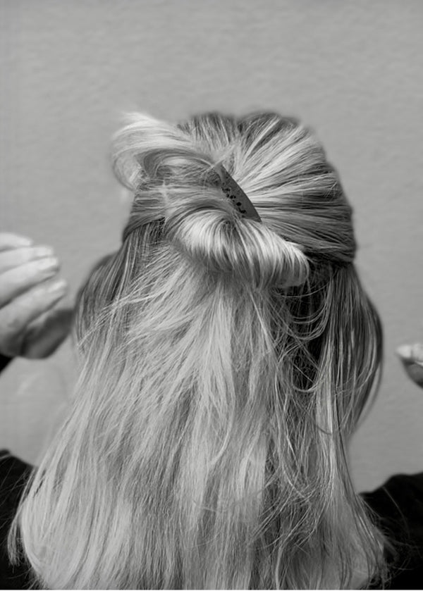 Half tuck or bring the layer right through. For a  more secure feel, pull to the ends of the HEKTUX.  A Great style for quick out of the way hair, sitting and sleeping.
